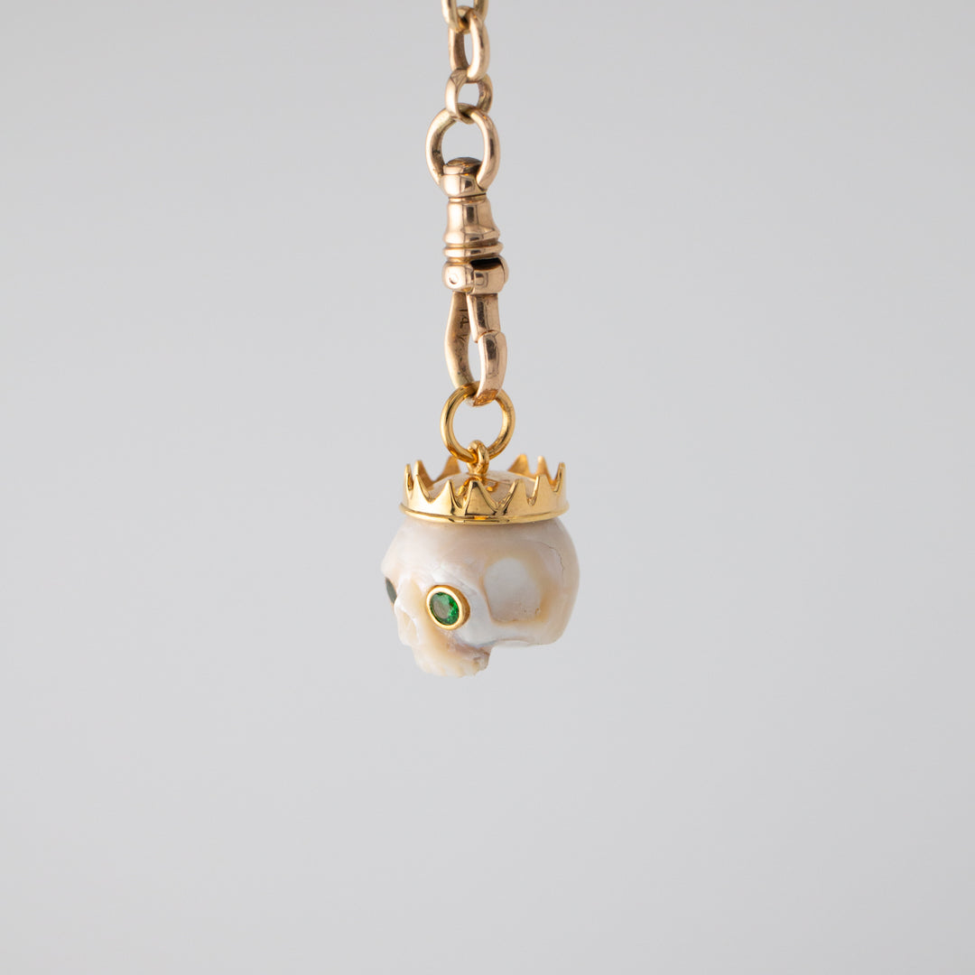 Zolita — Pearl skull with Tsavorite Eyes