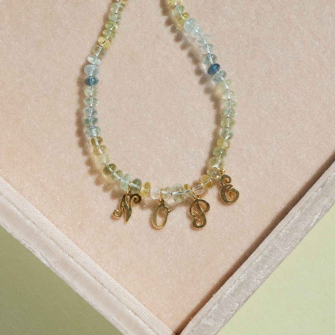 Nope — Aquamarine & Vintage Charms Knotted Necklace