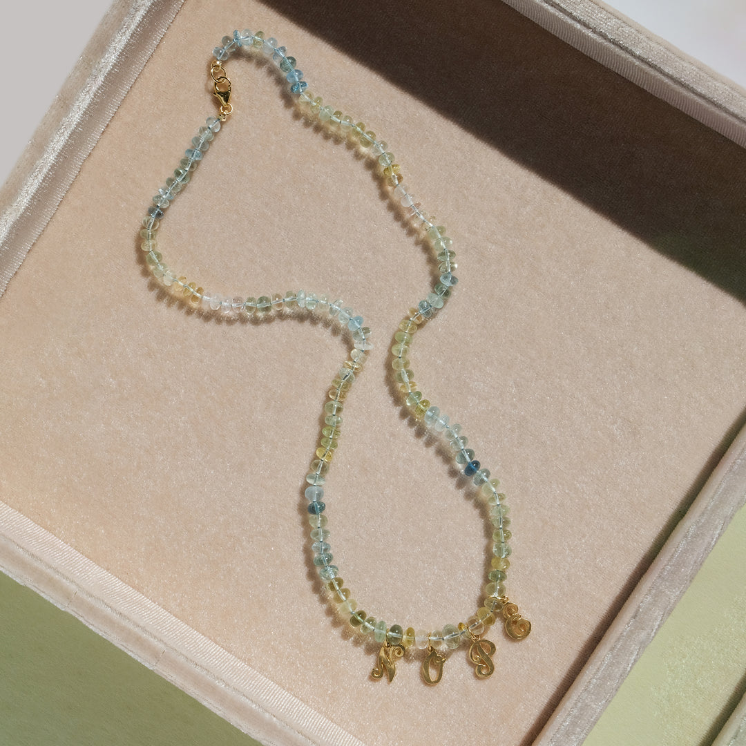 Nope — Aquamarine & Vintage Charms Knotted Necklace