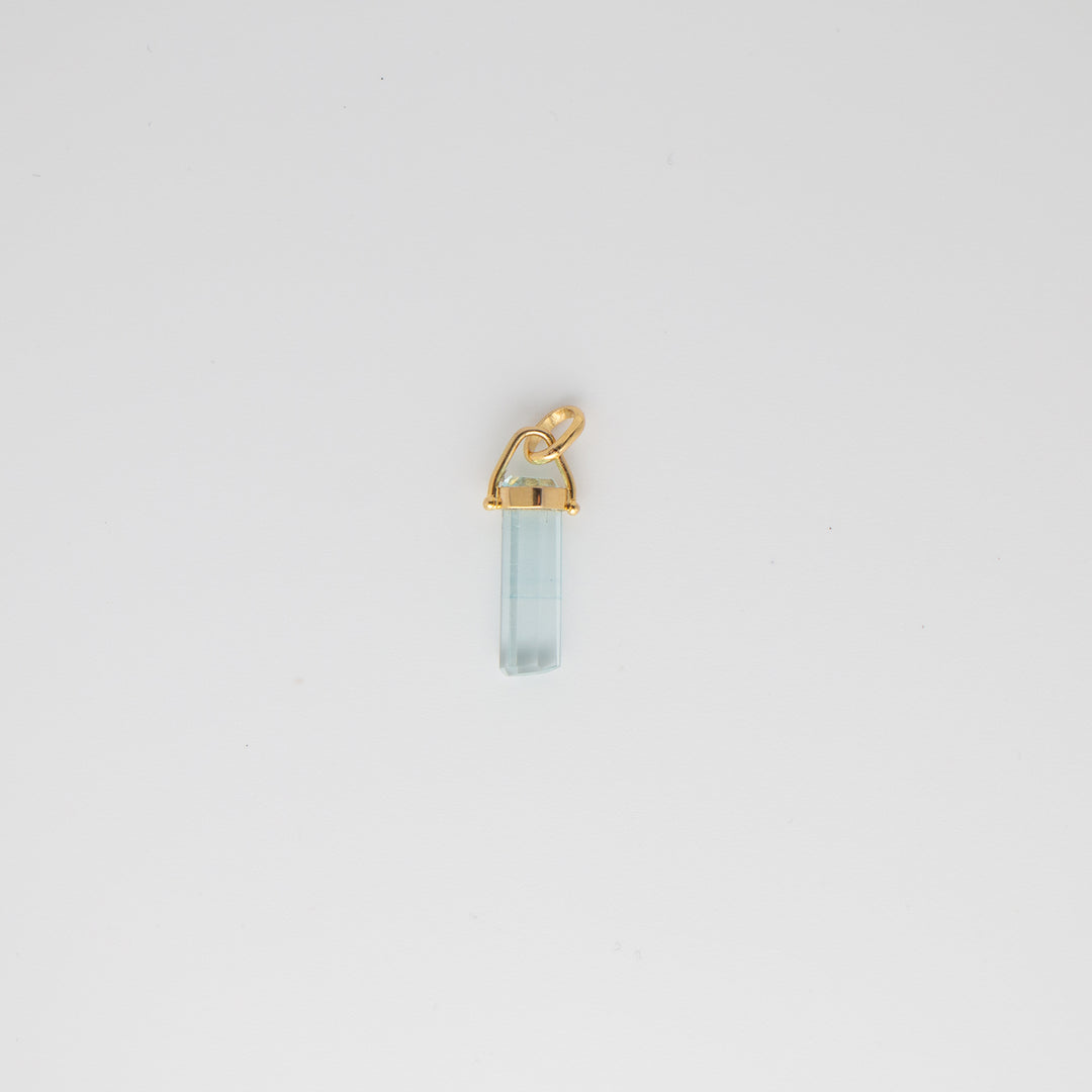 Aquamarine Crystal set in 14k gold charms