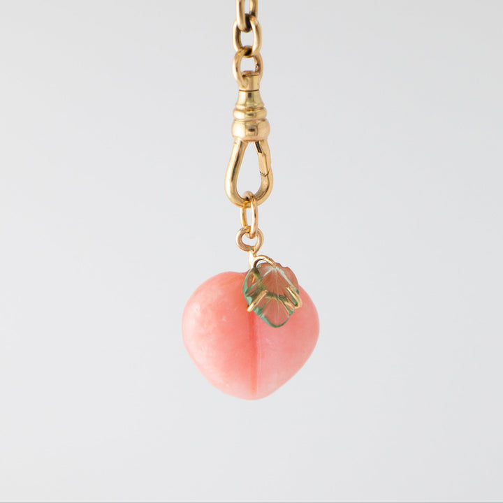 Peach Pink Peruvian Opal Carving with Tourmaline Leaf and 14k gold