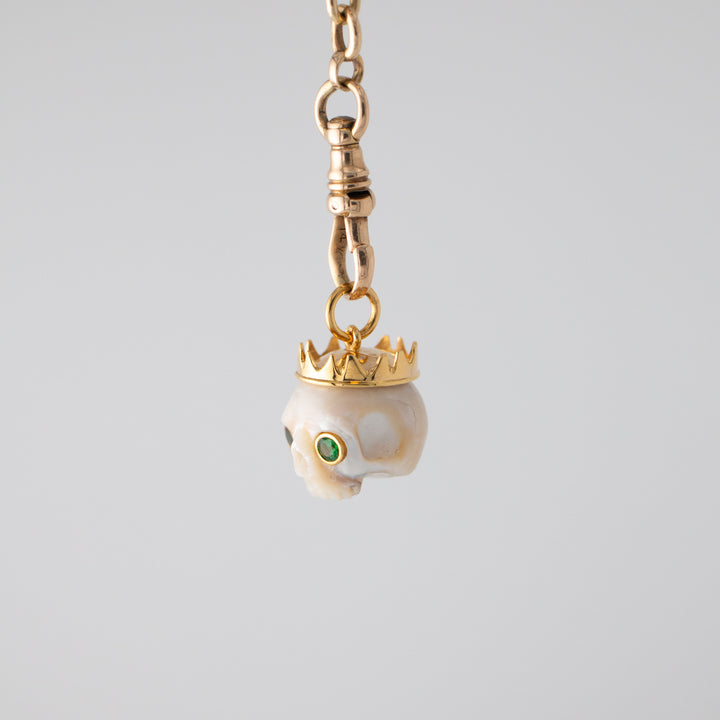 Zolita — Pearl skull with Tsavorite Eyes