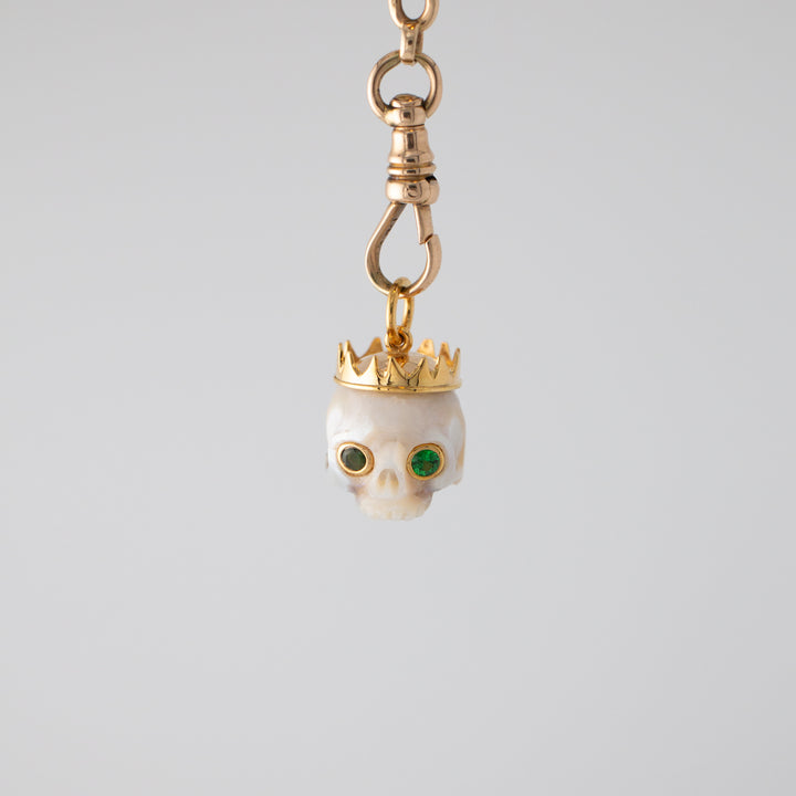 Zolita — Pearl skull with Tsavorite Eyes