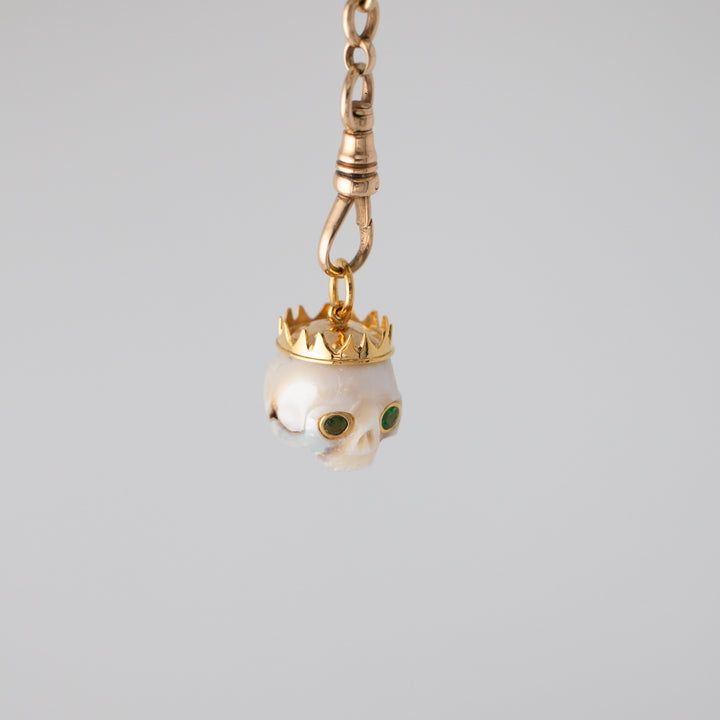Zolita — Pearl skull with Tsavorite Eyes