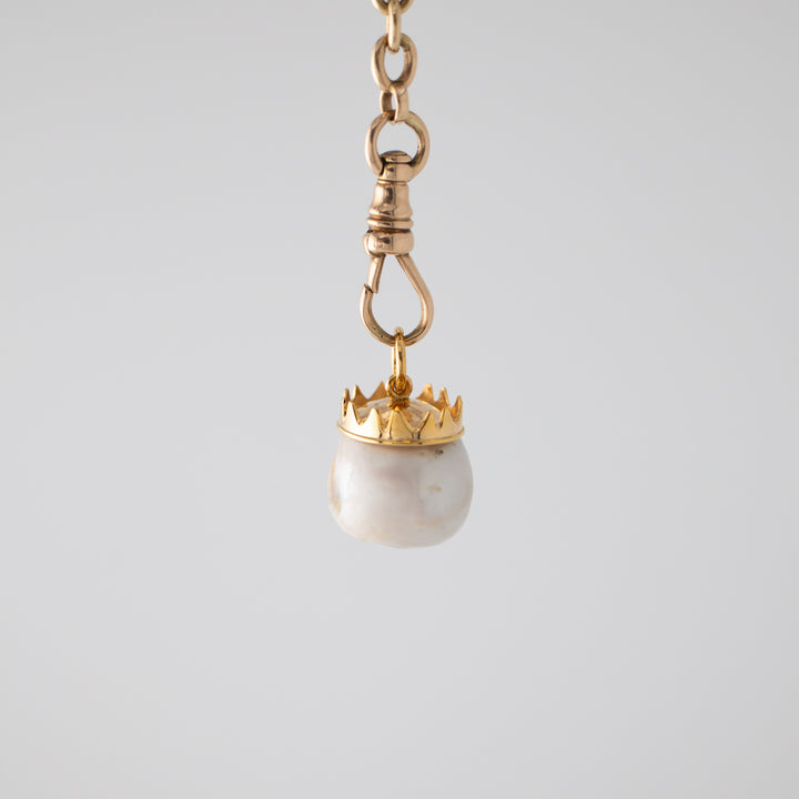 Zolita — Pearl skull with Tsavorite Eyes