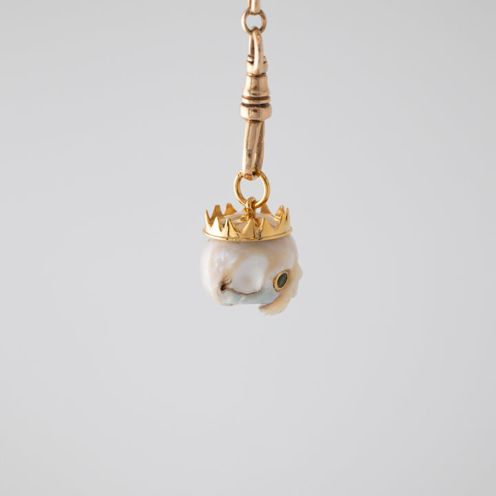 Zolita — Pearl skull with Tsavorite Eyes